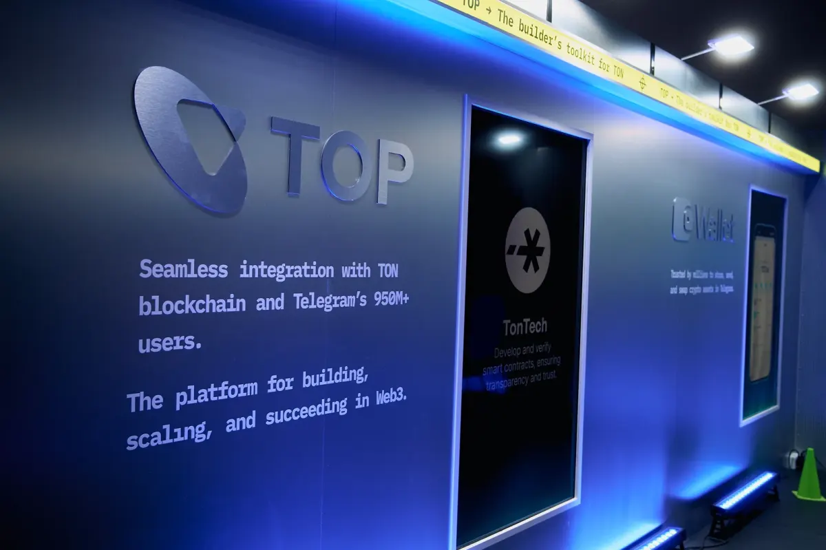 Conference event screen with partially readable blockchain and Telegram text in Dubai Conference event screen with partially readable blockchain and Telegram text in Dubai